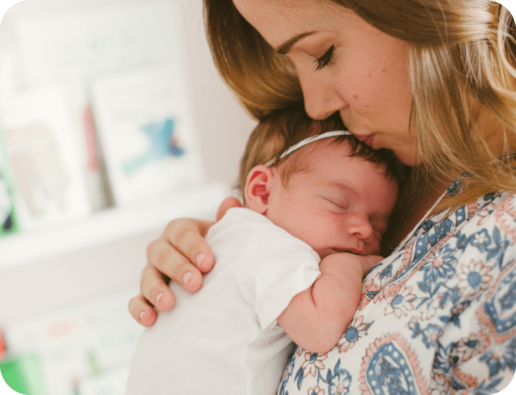 New mother holding her baby.