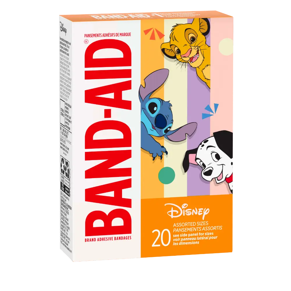 a box of 20 Band-Aid ®  brand adhesive bandages, each one tribute to Simba from The Lion King, Stitch from Lilo & Stitch, and Pongo from 101 Dalmatians