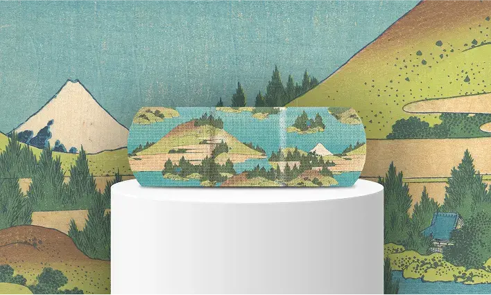 BAND-AID®️ Brand featuring a serene landscape design inspired by Japanese art, showcasing mountains, trees, and hills, part of THE MET collaboration.