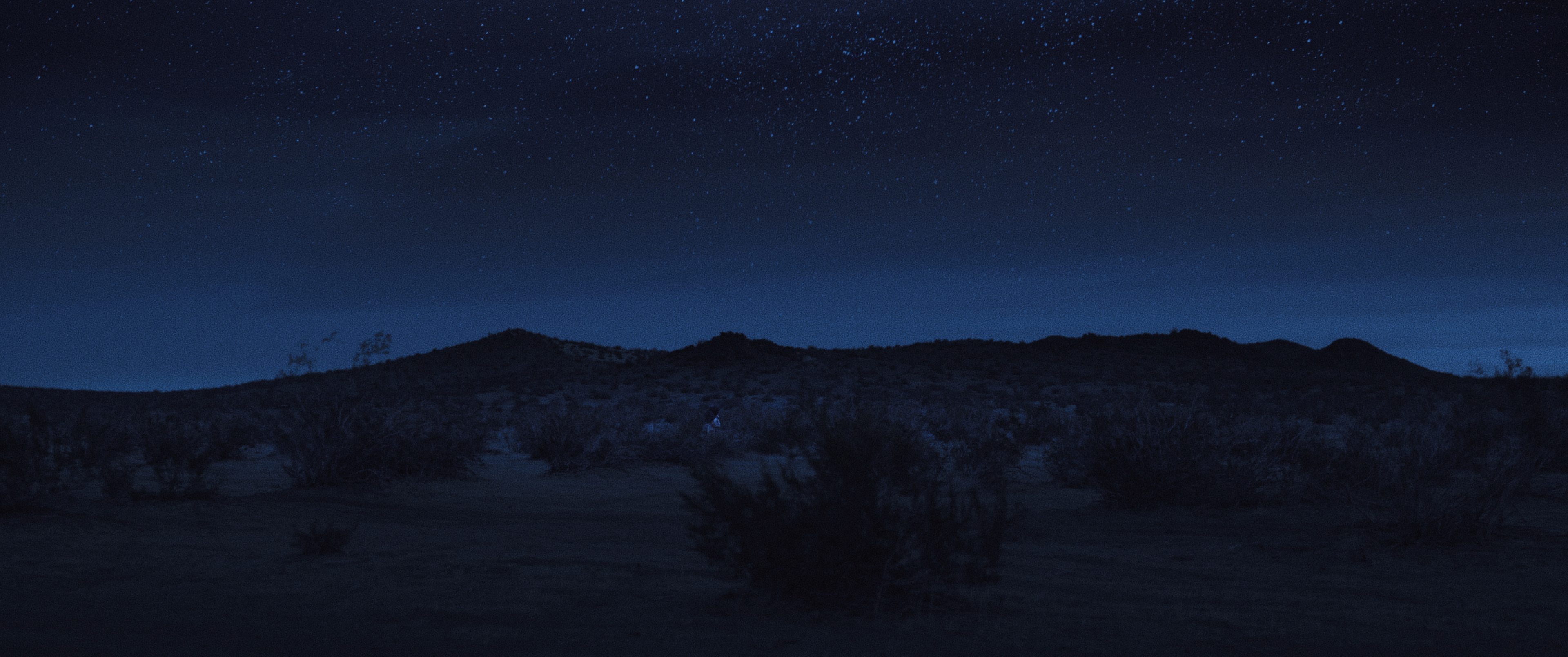 Starry night over mountains