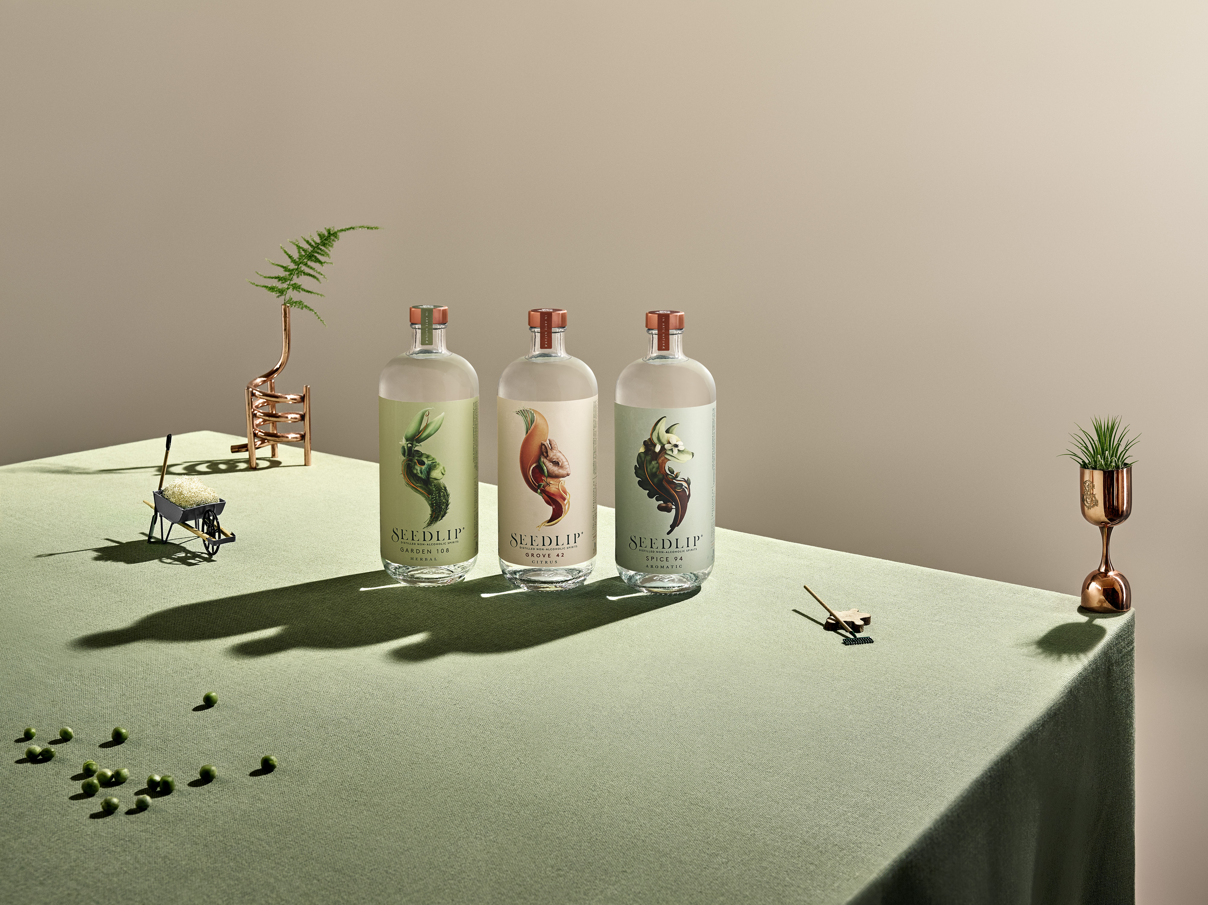All the Seedlip product range bottles lined up on a countertop