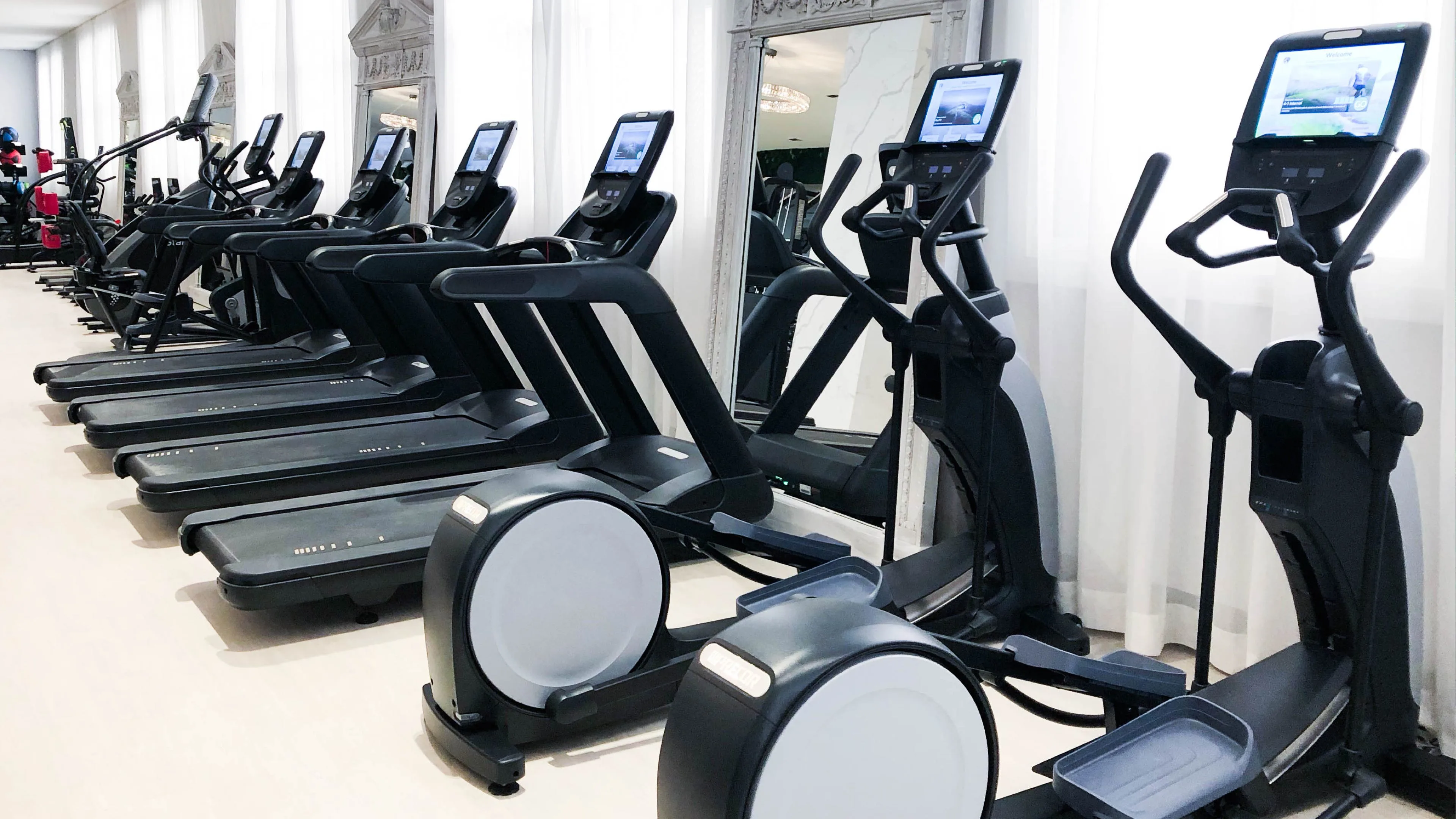 Precor cardio equipment in a gym setting
