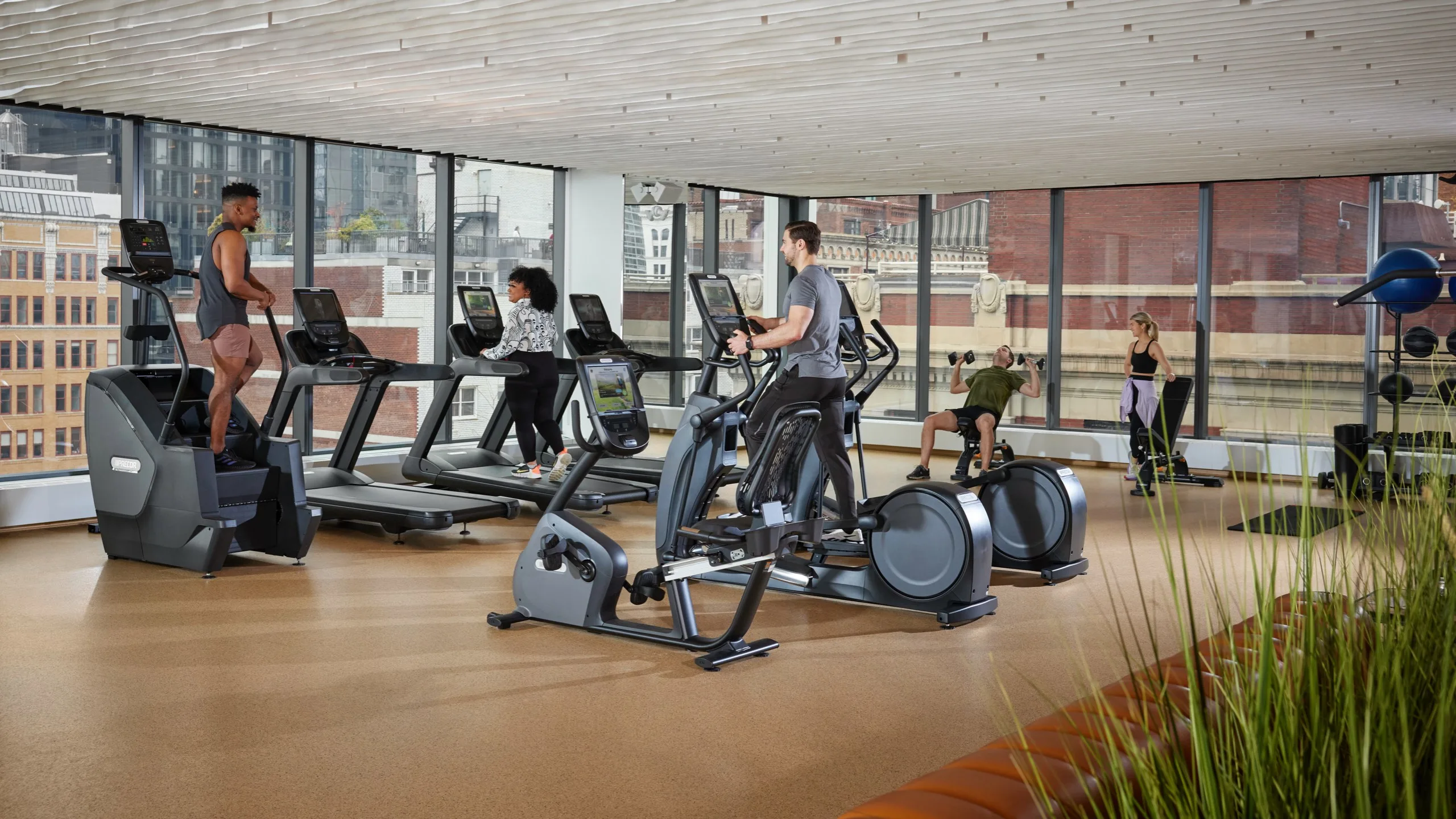 Precor cardio and strength equipment in a gym