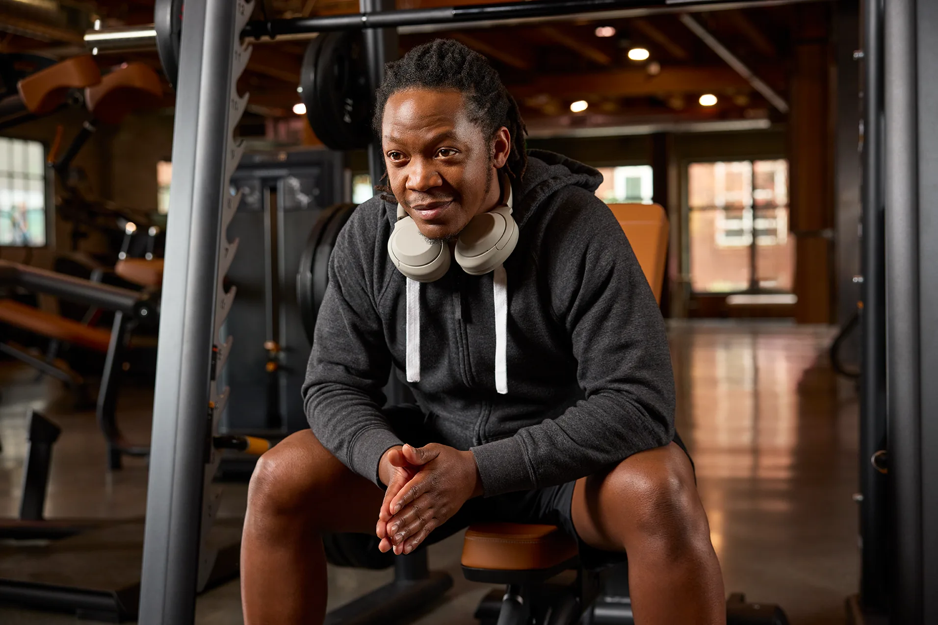 Strength Closeup, Man on DPL Smith Machine and Bench
