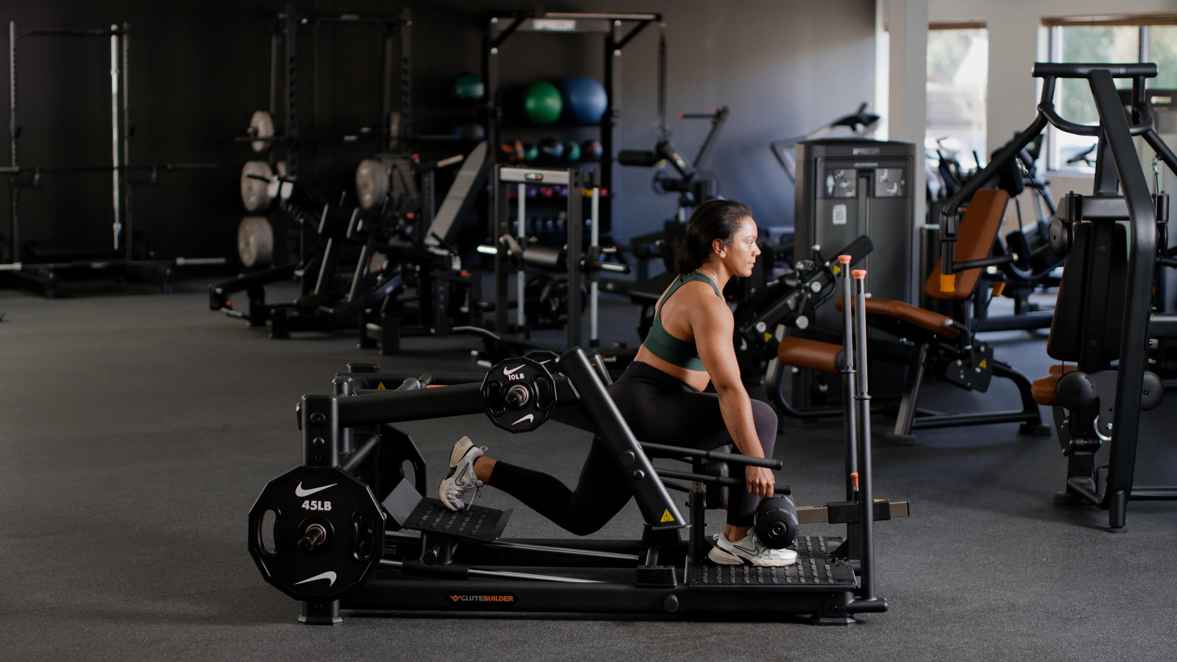 Glutebuilder in use by exerciser