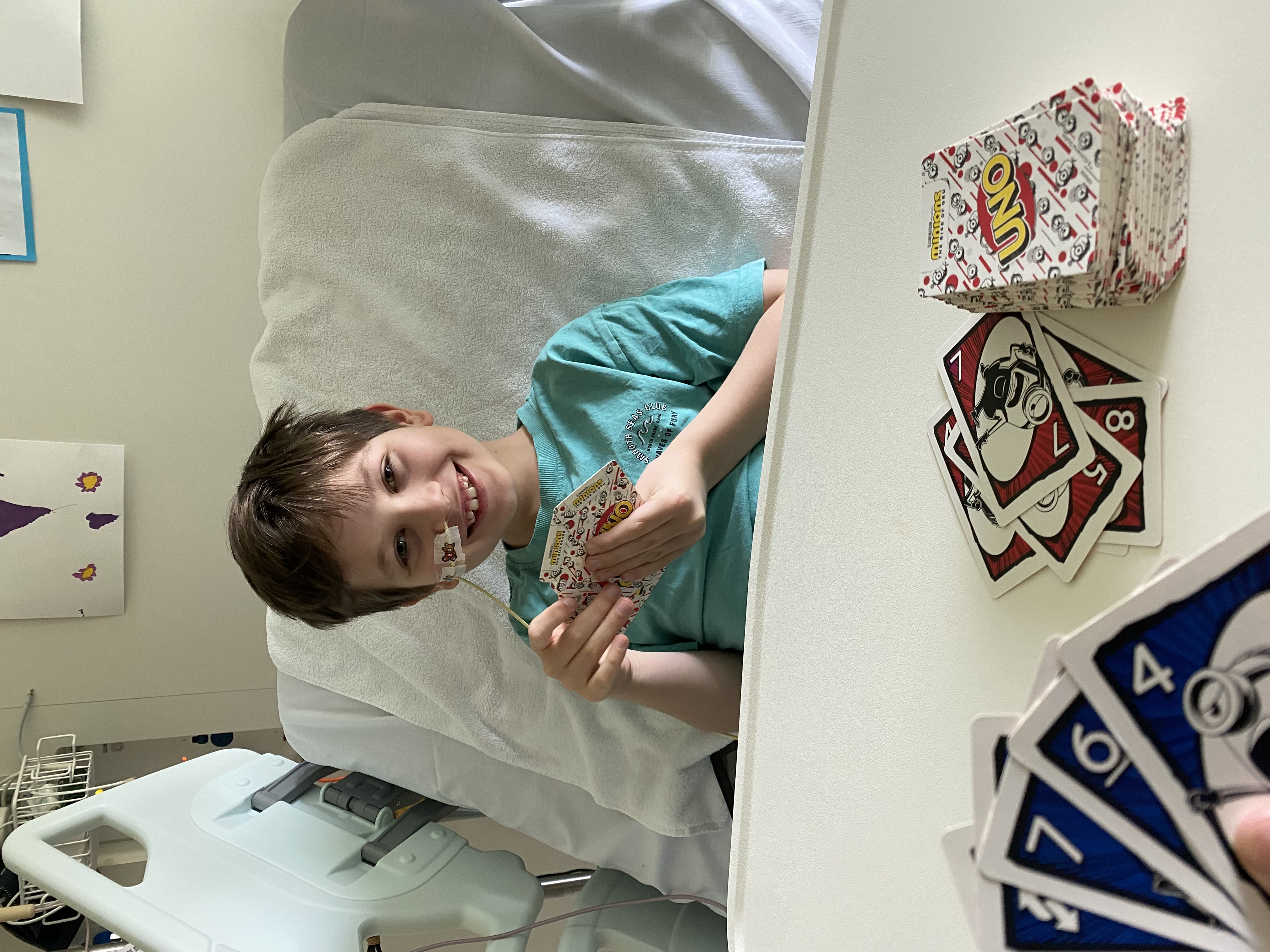 Jace in hospital bed smiling