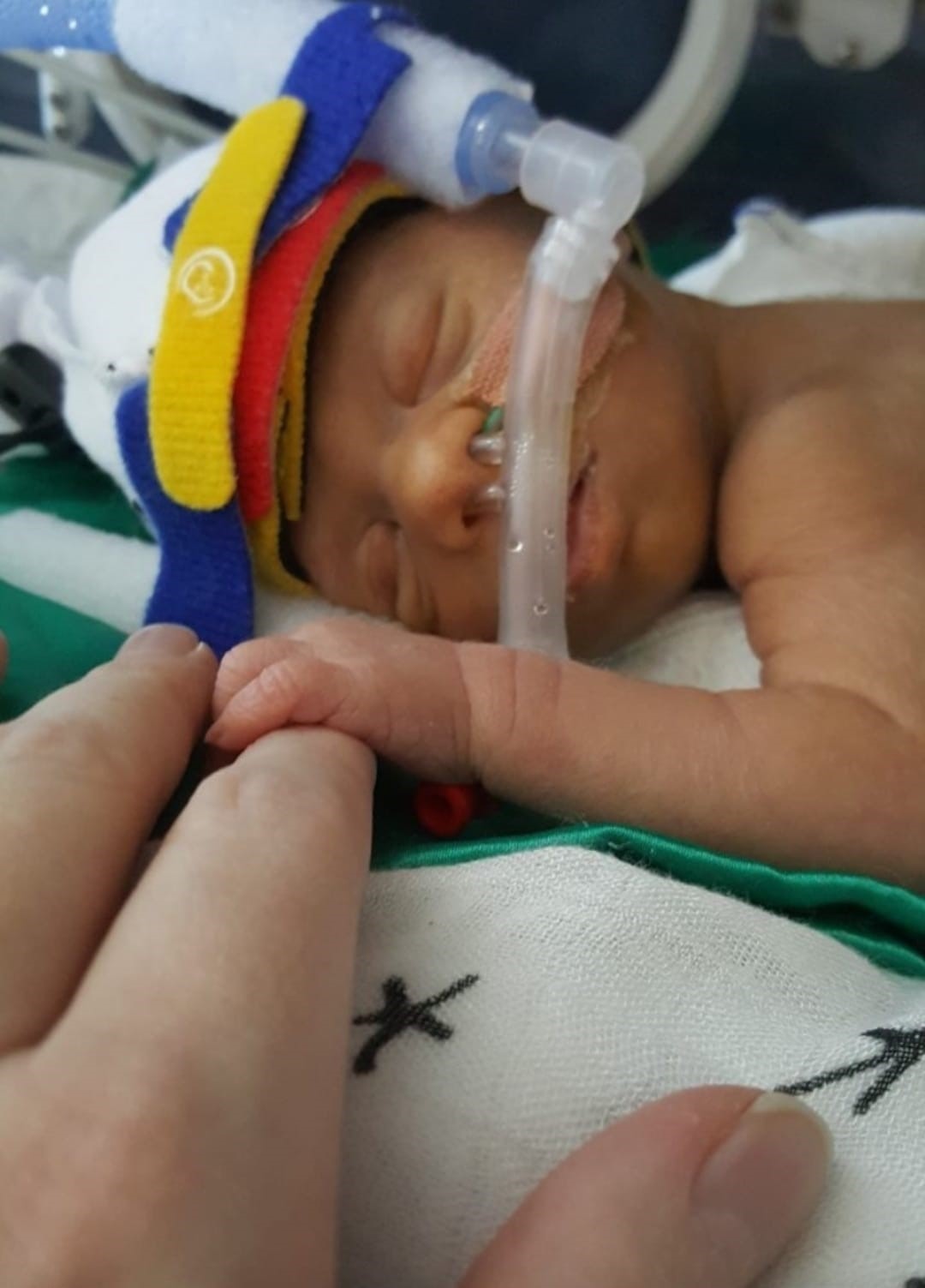 Oliver as a bub in hospital