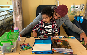 Taiyo and dad with gifts - card