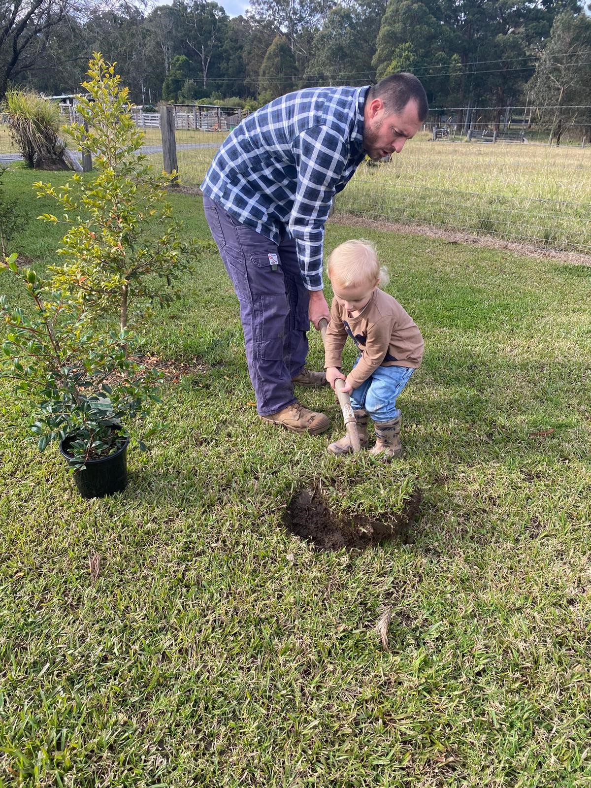 Jack with dad on farm