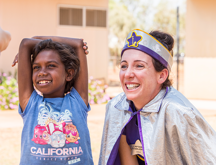 Captain Starlight smiling with girl