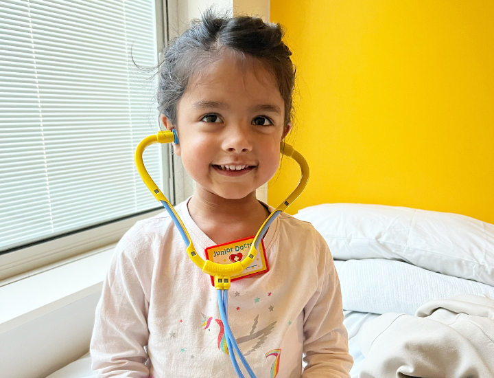 Priya wearing stethoscope