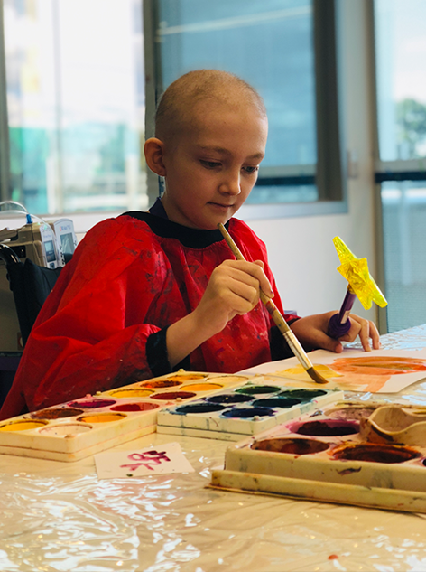 Emily painting in the Starlight Express Room