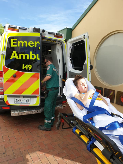 Gus in ambulance