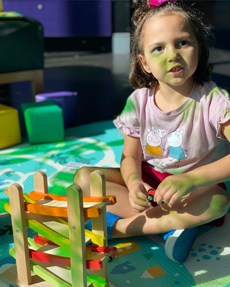 Ava building blocks in the Starlight Express Room