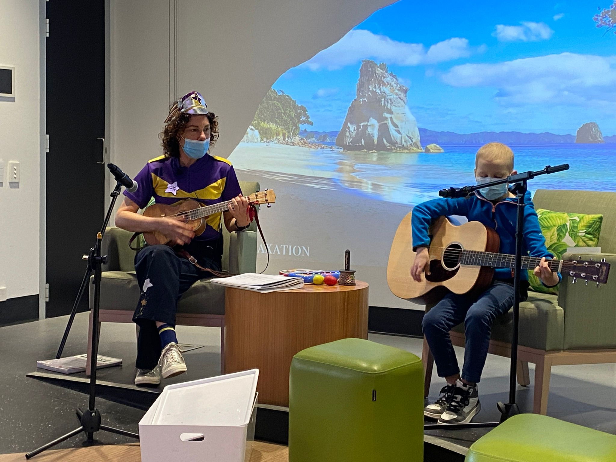 Sam and Captain Starlight playing guitar in the SER