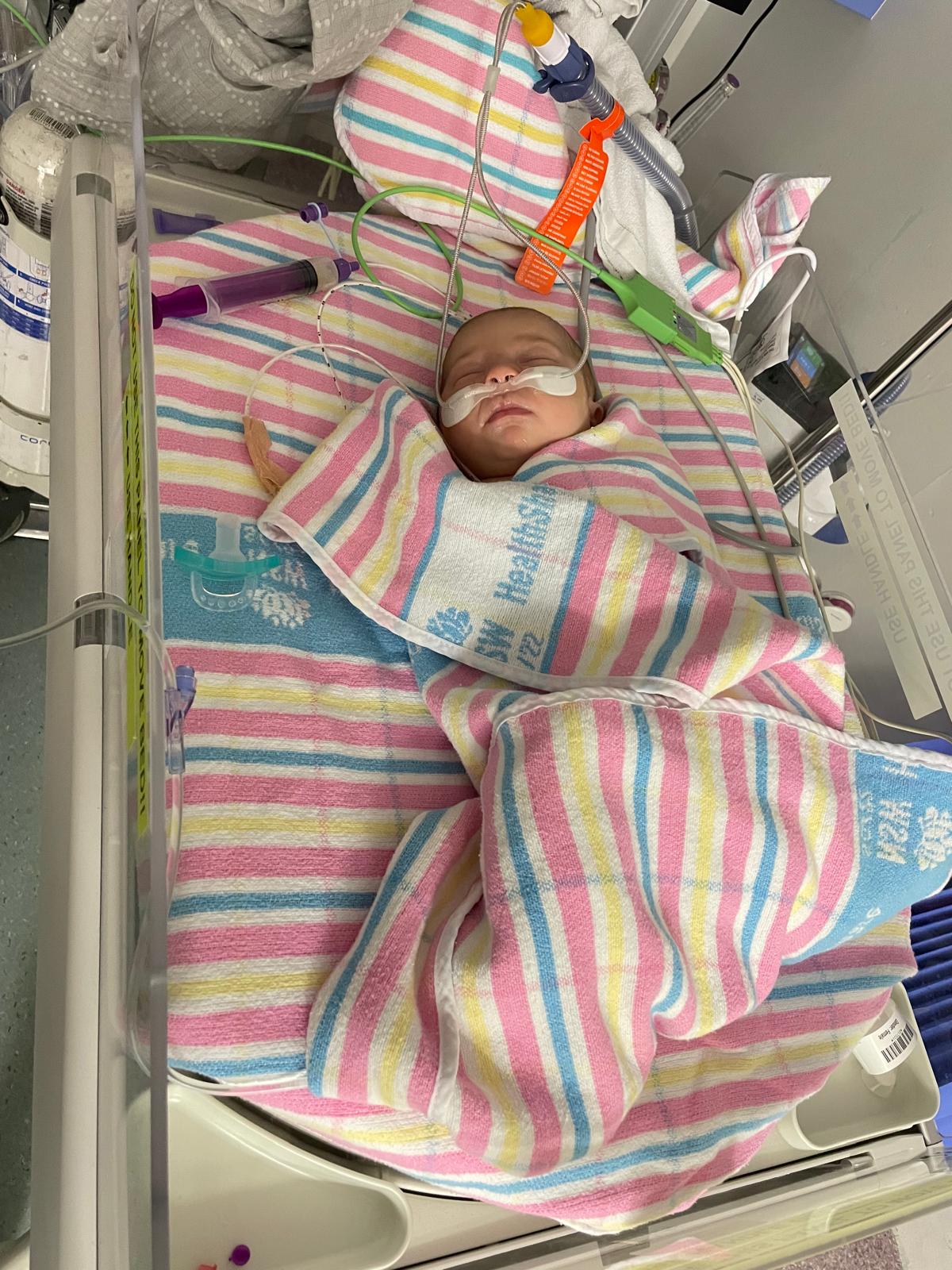 Claudette as baby in hospital