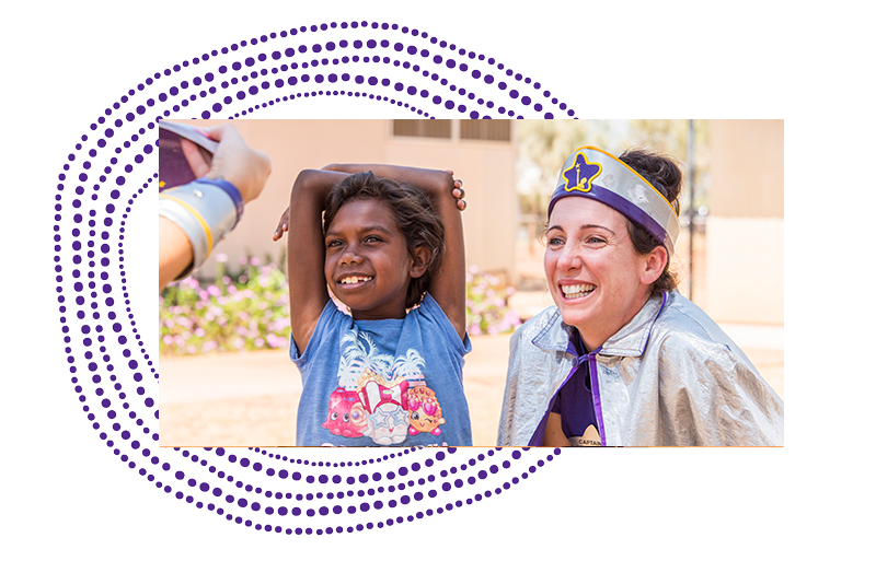 Captain Starlight and girl smiling during community visit