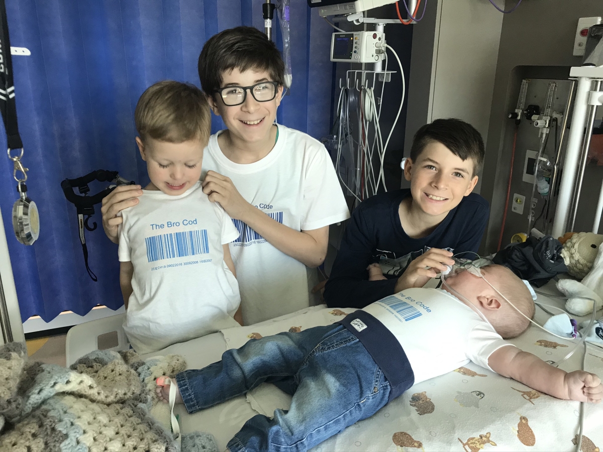 Winston in hospital with his brothers