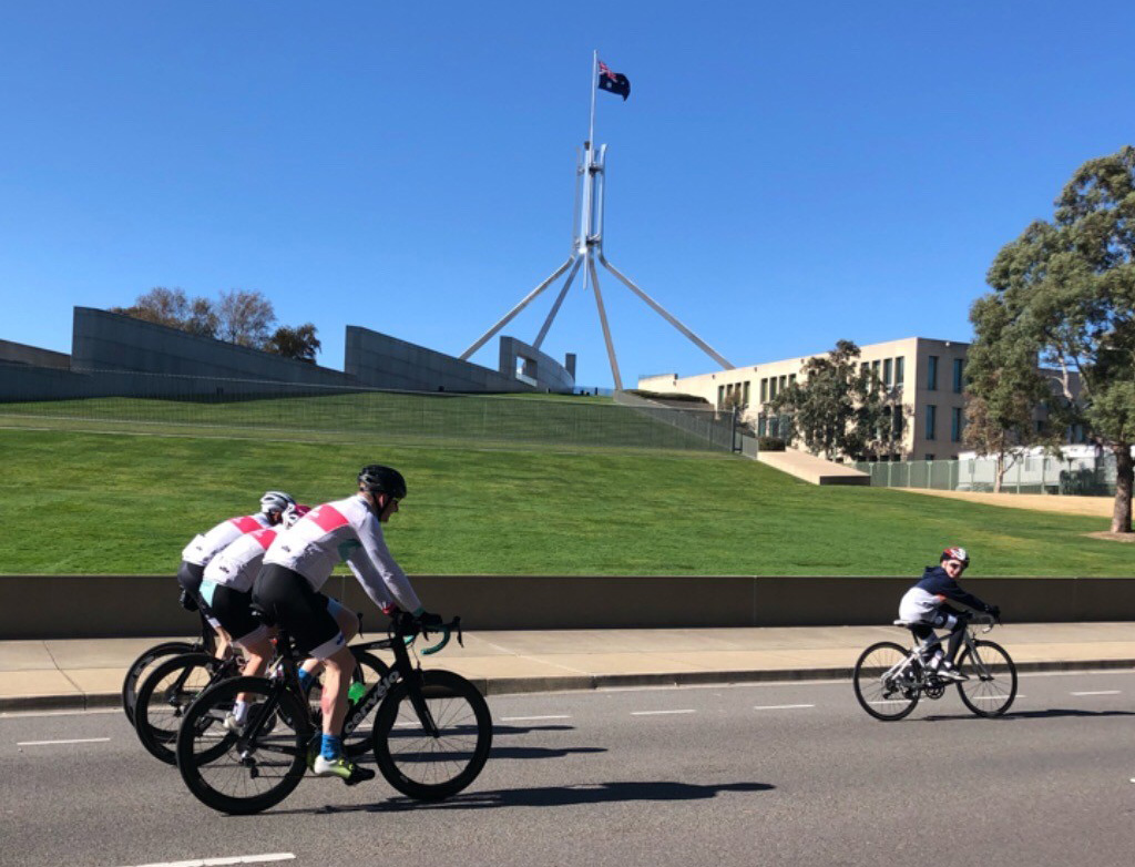 Harry-riding-for-TDK-past-Parliament-House-cropped