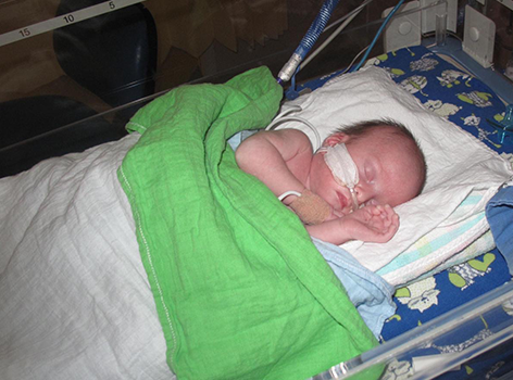 Dale as a baby in hospital