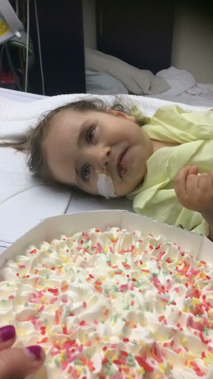 Scarlett in a hospital bed
