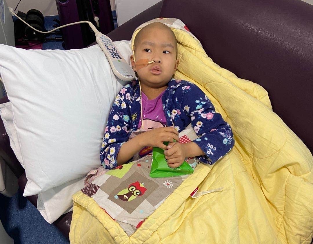 Nia in hospital bed
