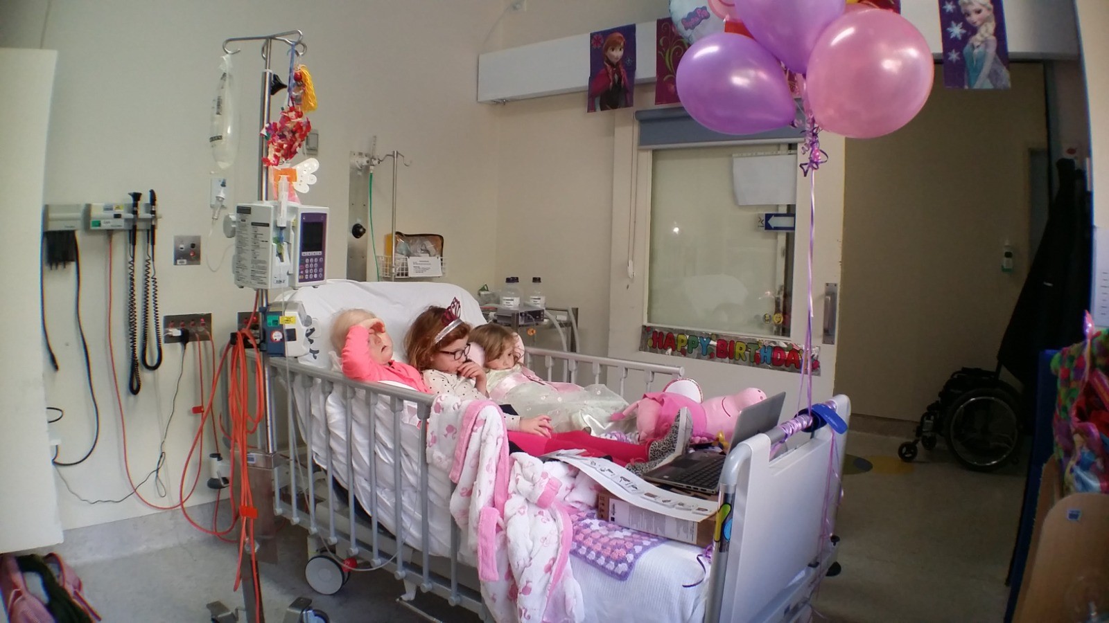 Lily having her birthday in hospital with best friend Phoebe and sister Isla just after diagnosis