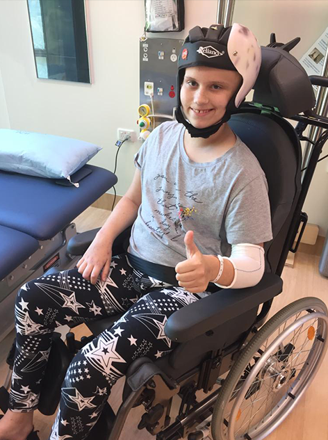 Fleur in wheelchair