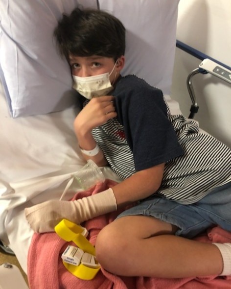 Tommy in hospital bed