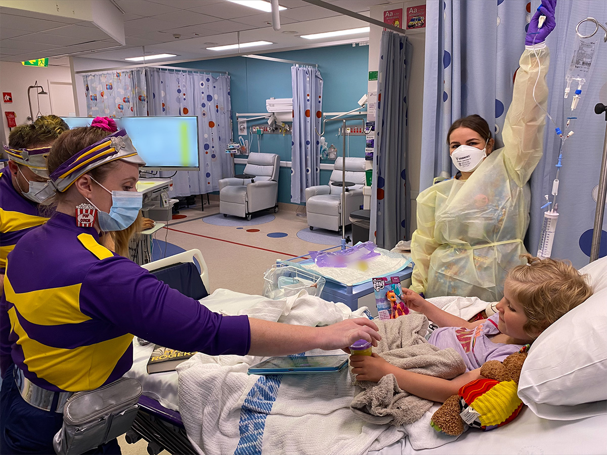 Roxy being entertained by the Captains on the ward