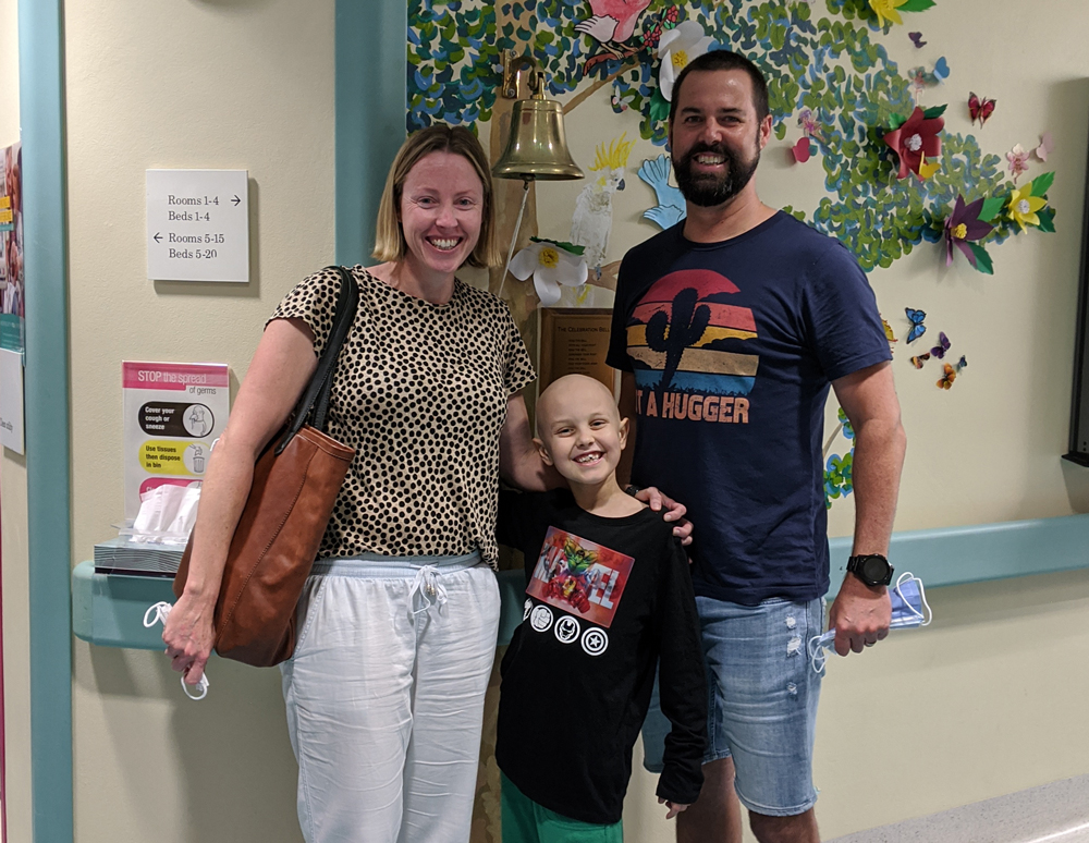 Rohan in hospital with his parents