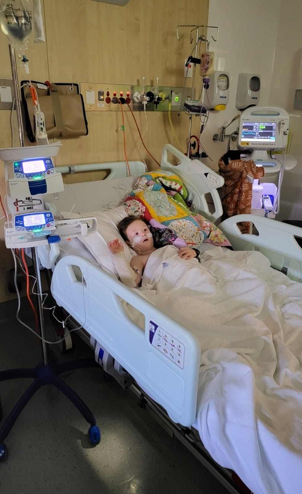 Oliver in ward bed