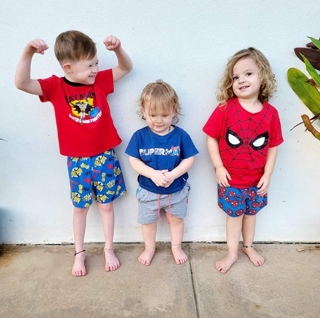 Oliver with his siblings superheros