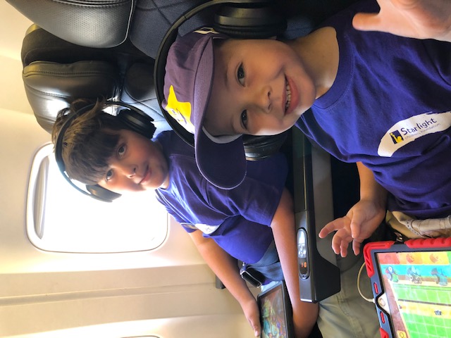 Logan on plane on his way to Starlight Wish