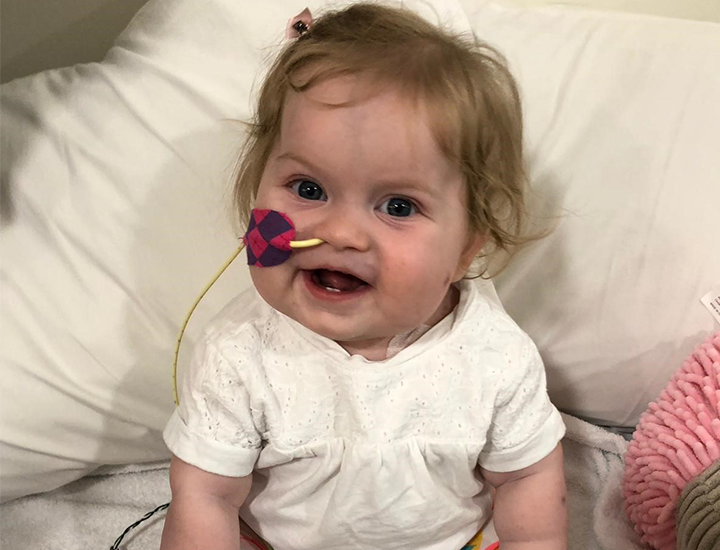 Ellie smiling in hospital - banner
