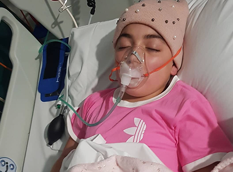 Alyssar sleeping in hospital
