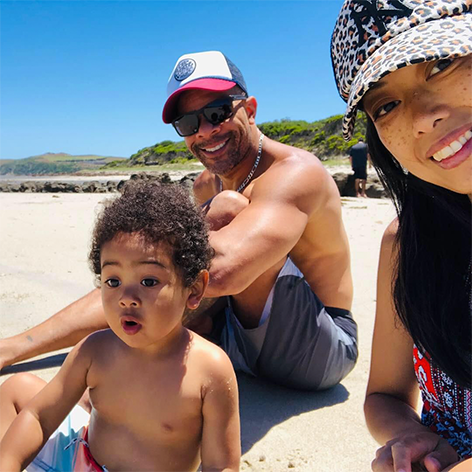 Taiyo and his parents at the beach