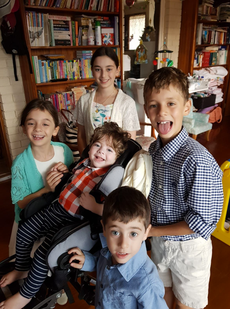 Em with siblings
