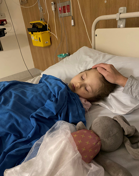 Amelia sleeping in hospital bed