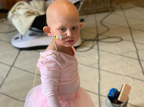 Ava during treatment wearing tutu