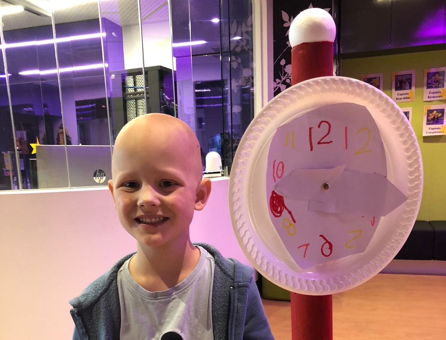 Henry with a clock he made in the Starlight Express Room