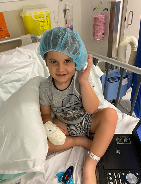 Bertie wearing hairnet in hospital