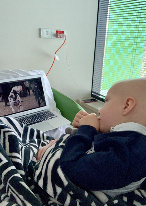 Hunter watching 101 Dalmatians in hospital