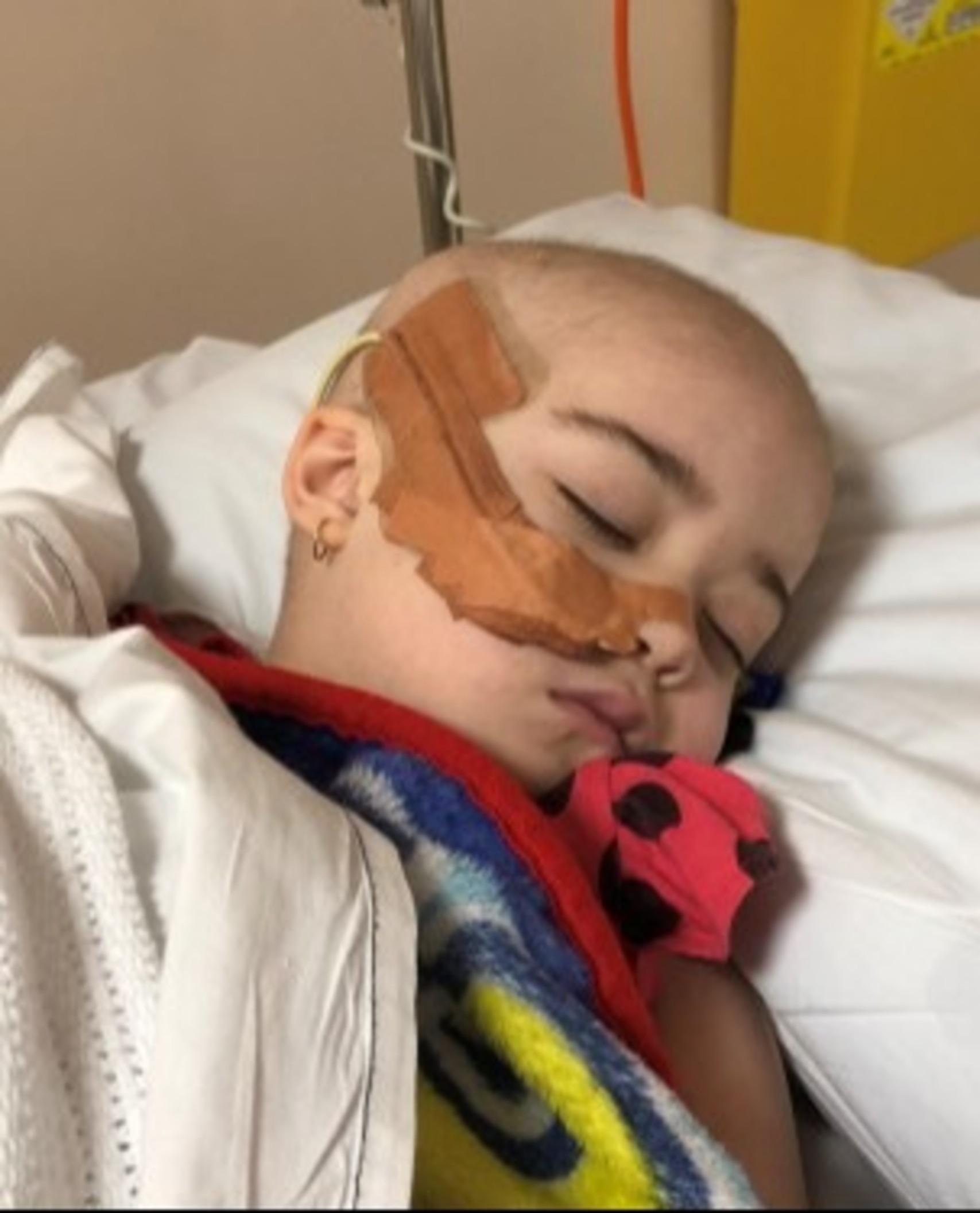 Madilyn sleeping in hospital
