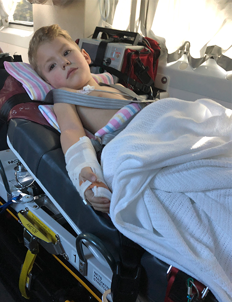 Oliver in ambulance