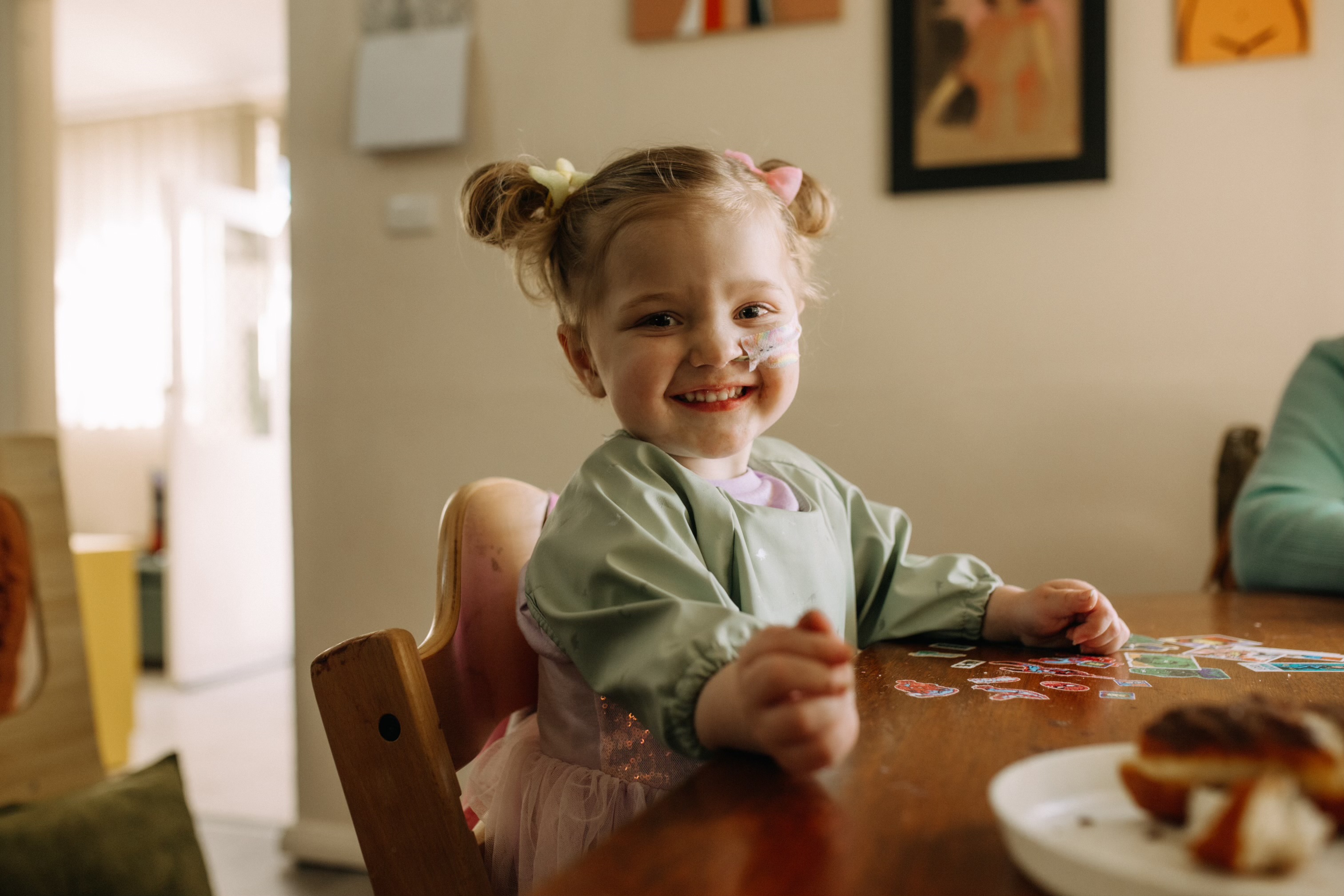 Lottie at breakfast table