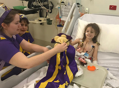 Captain Starlight at Holly's bedside