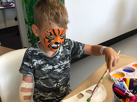 Oliver painting in the Starlight Express Room