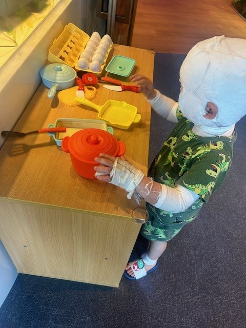 Leo doing crafts in SER
