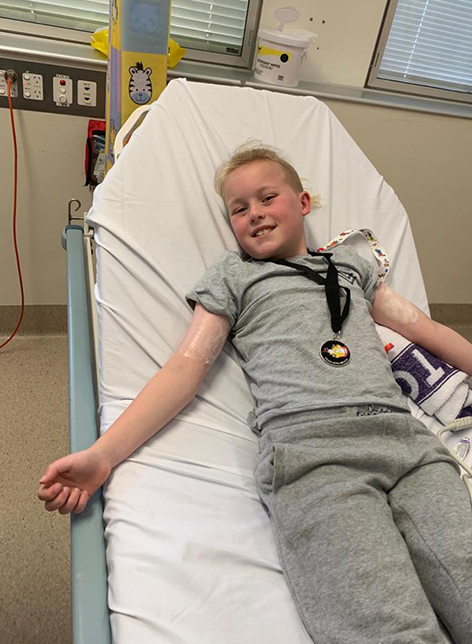 Older Will in hospital bed
